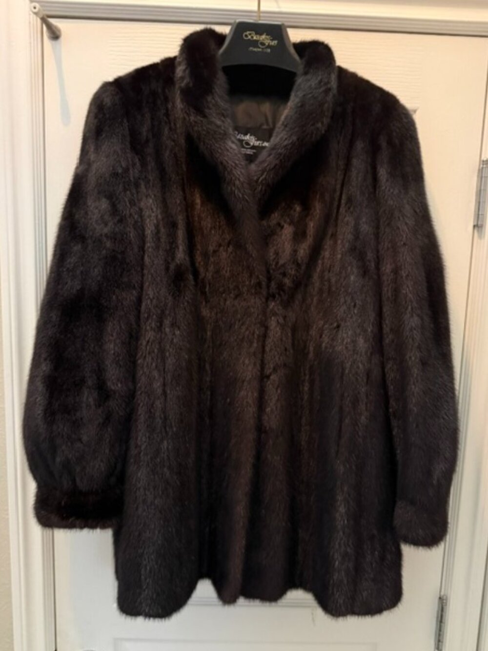 Black 3/4 length mink jacket by Bizakis Furs Inc